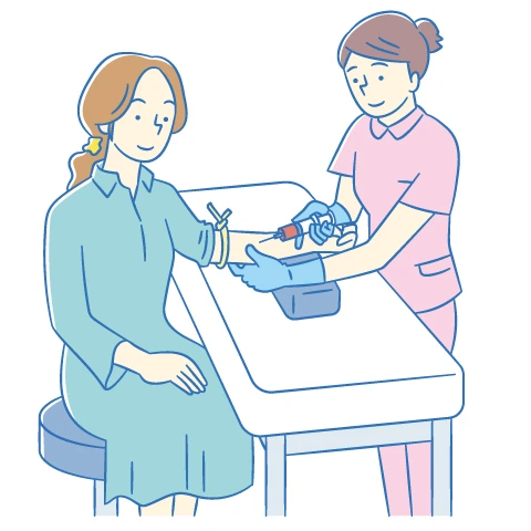 妊婦健診で血液検査を受ける妊婦